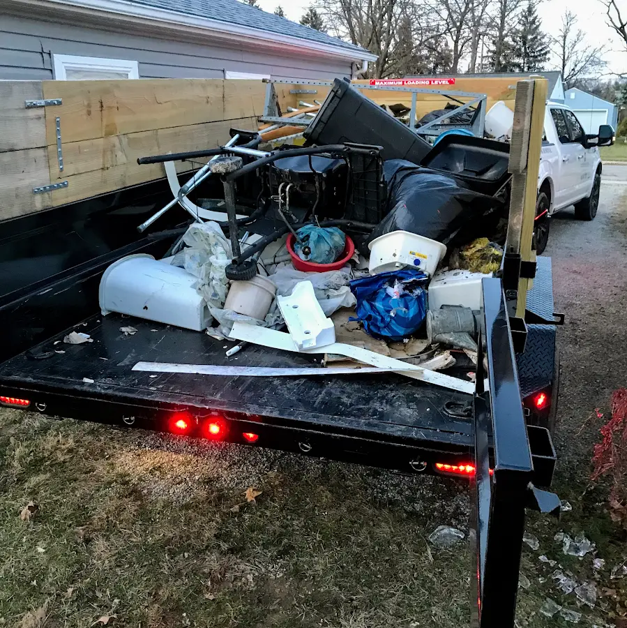 Roll-off dumpster delivered to a residential driveway in Old Lyme